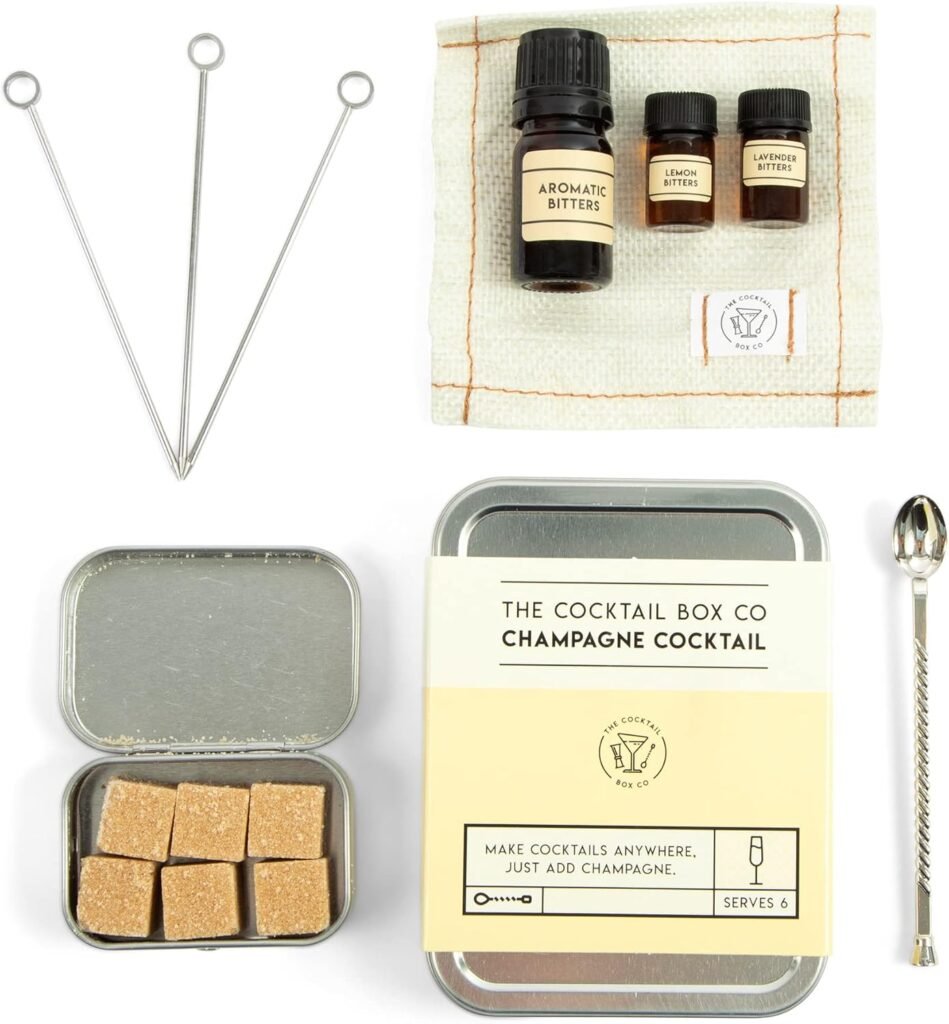 The Cocktail Box Co – Champagne Cocktail Carry-On Kit for Travel, TSA-Friendly Bar Set Champagne cocktail carry-on kit with bitters, sugar cubes, stirring tools, and mini bottles from The Cocktail Box Co